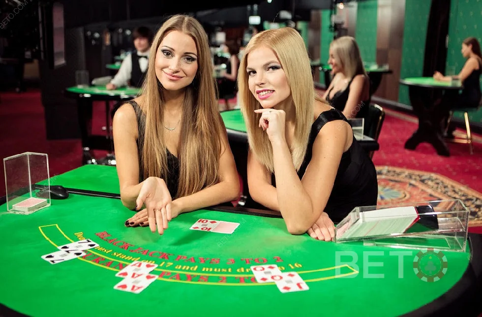 Tampilan ruang kasino live IYA777 dengan meja dealer